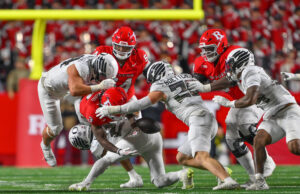 Moore, Whittington Lead No. 8 Oregon In 56–10 Rout Over The Scarlet Knights