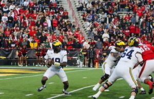 No. 18 Michigan Overpowers Maryland Behind Kuzdzal’s Three-TD Performance