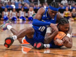 Auburn Rallies Late, Captures First NIT Championship In Overtime Thriller