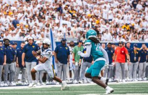WVU Opens Season With Victory As Pat White’s No. 5 Takes Its Place In History