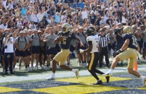Navy Flexes Its Muscle in Maryland Showdown, Rolling Past Towson 42-15